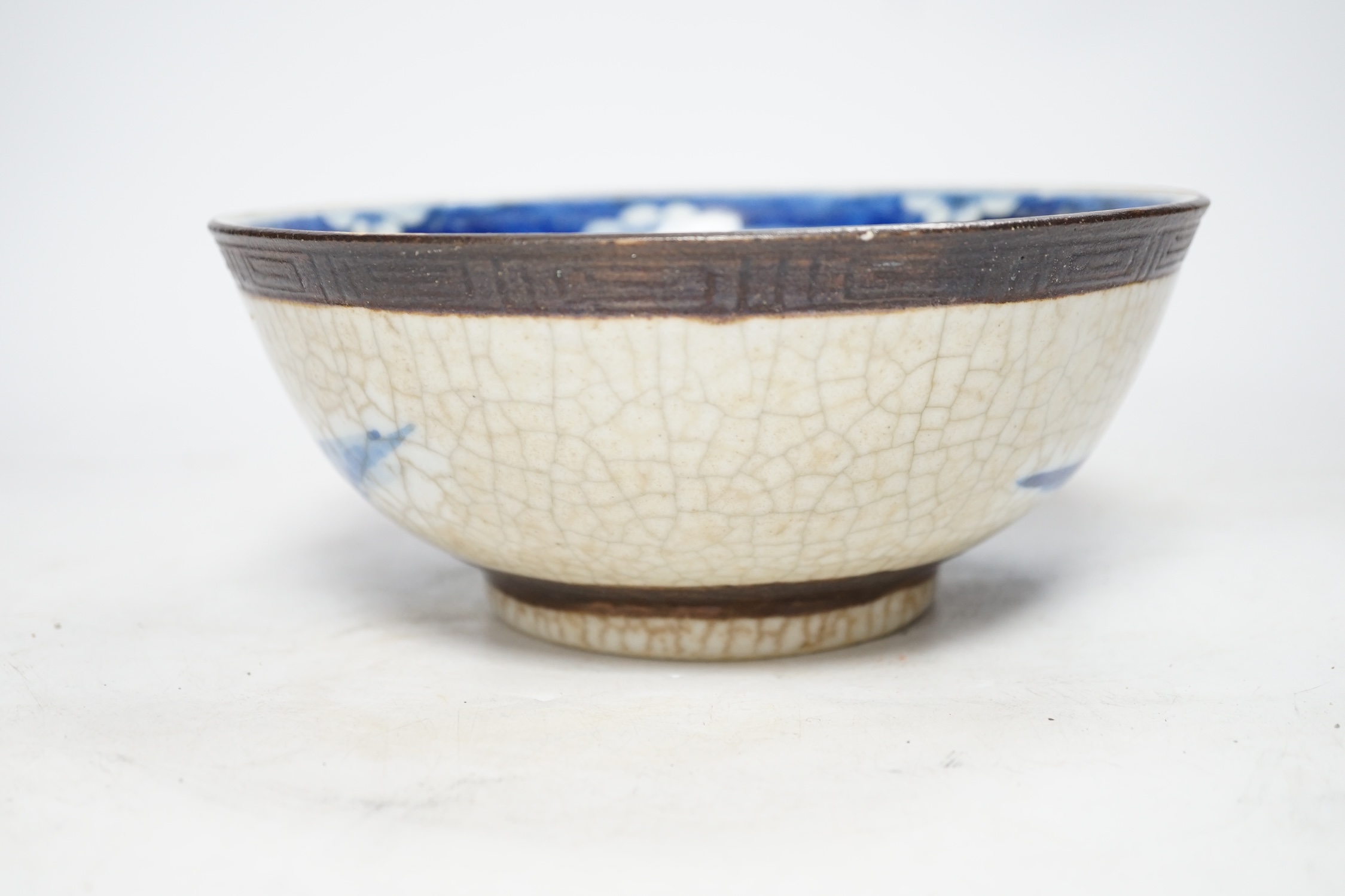 A Chinese blue and white crackle glazed bowl, early 20th century, 21cm diameter